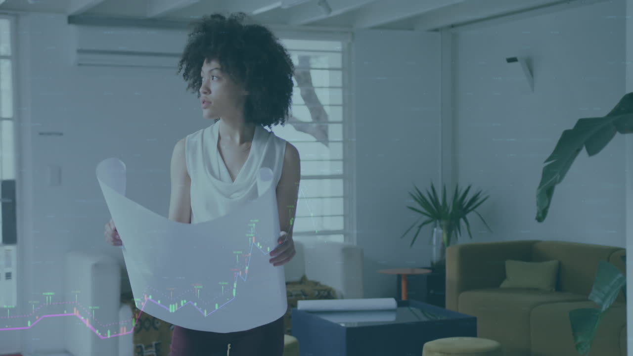 animación del procesamiento de datos financieros sobre una mujer de negocios afroamericana que trabaja en la oficina.