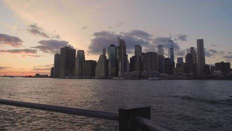 Gimbal-shot-of-lower-manhattan-waterfront-at-sunset