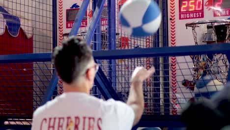 player shooting hoops at arcade basketball game