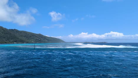 scenic ocean view leaving moorea island on passenger ferry traveling to tahiti, french polynesia
