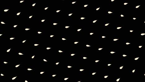 abstract pattern of beige drops on black background