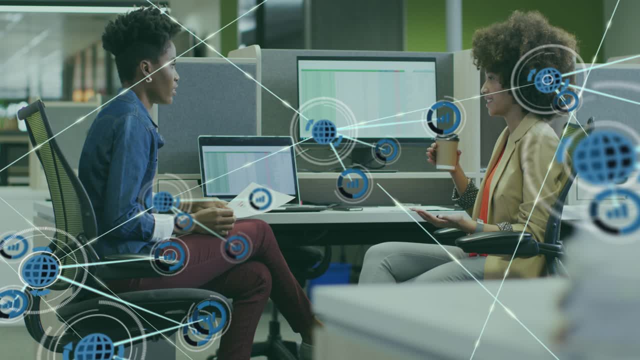 Left woman glancing at laptop, right woman gesturing, starting network linking docs for business