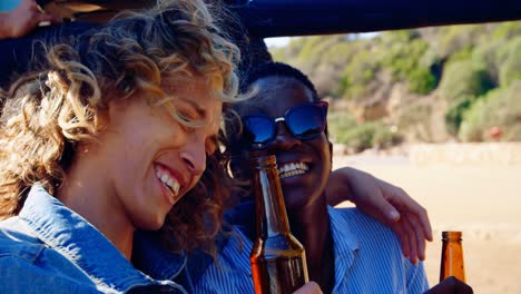female friends having fun in the car 4k