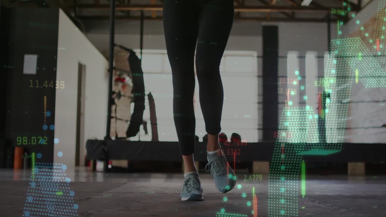 Woman performing rope cardio routine starting midjump on gym floor with animated charts over feet