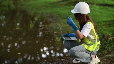 environmental engineers work at water sources used for consumption in the community