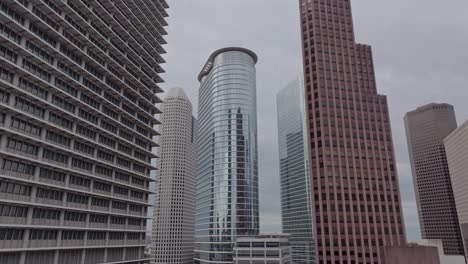 high rise structures in downtown houston on a cloudy day