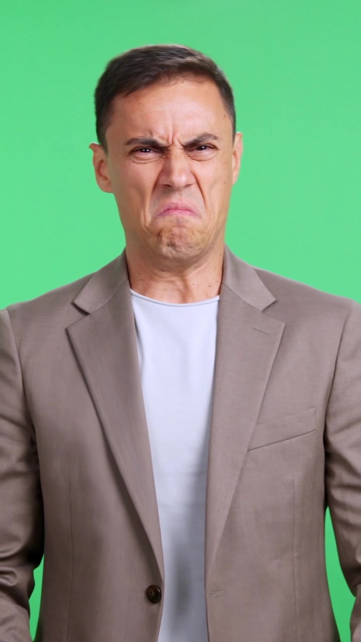 Confused mature man scratching his head