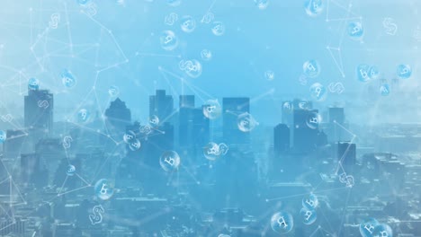animation of network of connections and bitcoin symbols floating against aerial view of cityscape