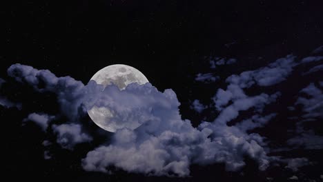 timelapse of the rising moon against the starry sky obscured by passing clouds