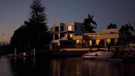 sunset view of waterfront homes and boats