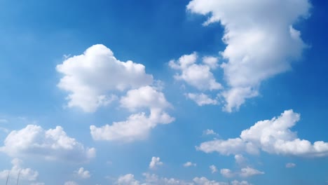 beautiful time-lapse of clouds in the daytime in the sunny sky with smooth panning