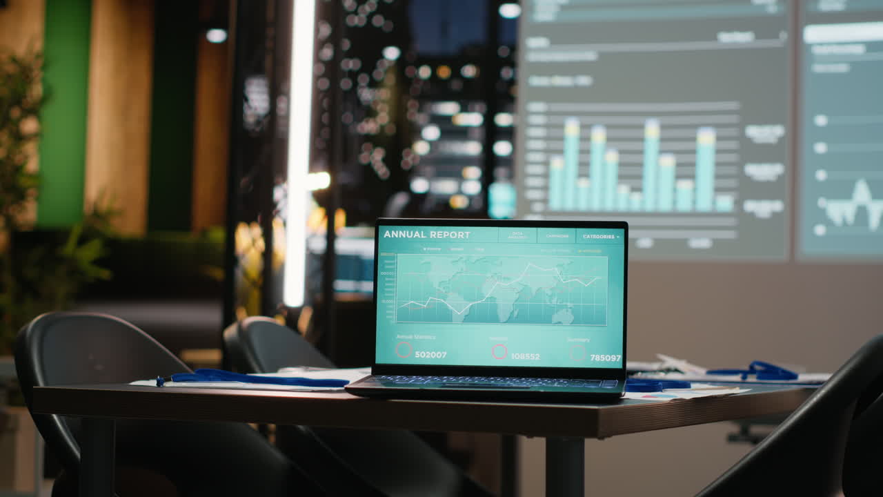 Close up of laptop in empty corporate office after hours