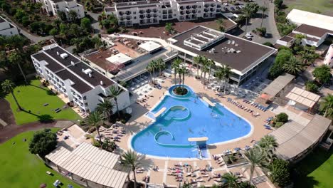 wide aerial view looking down on the amazing playitas resort in spain