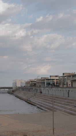 barcelona beaches almost empty during the coronavirus lockdown in vertical