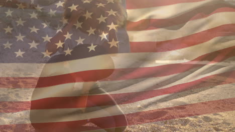 animation of flag of usa over african american couple at beach