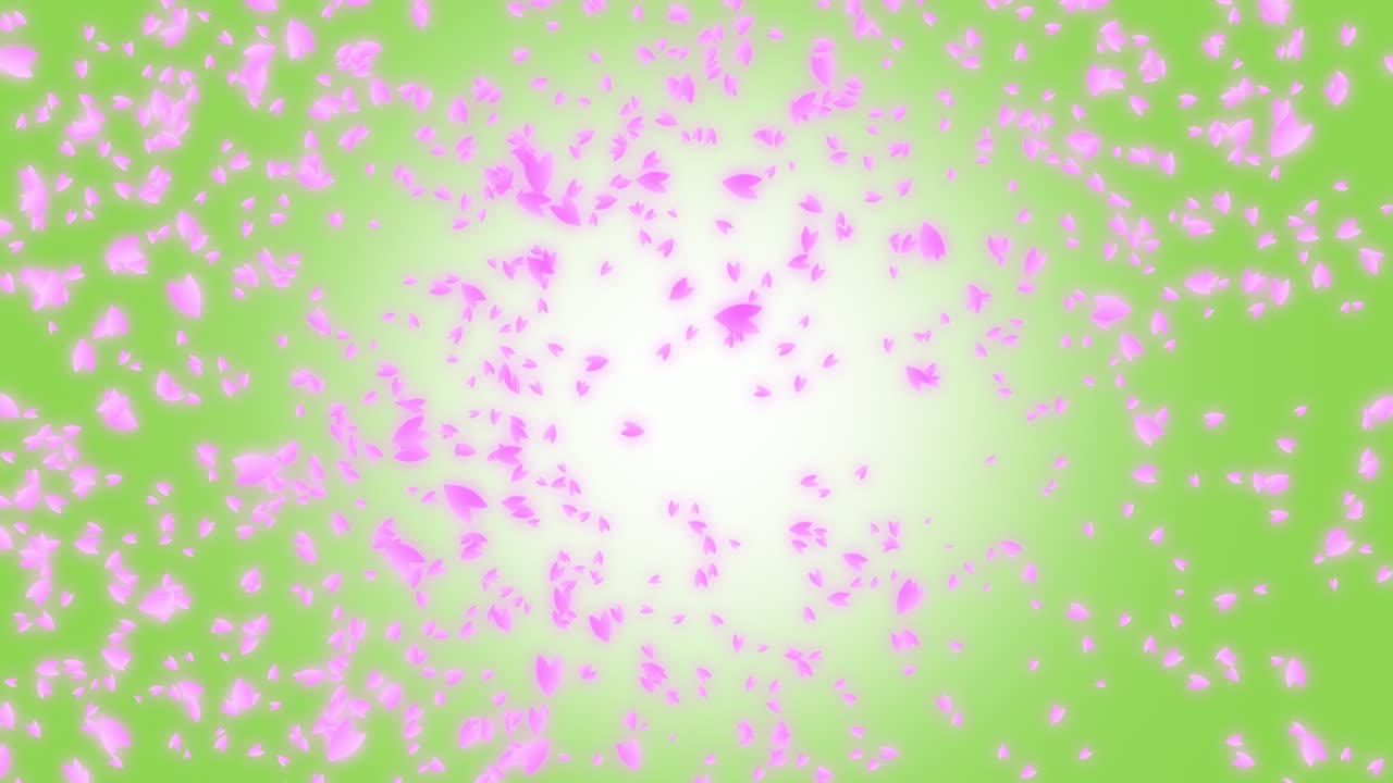 핑크색 꽃의 잎자루가 녹색과 색의 배경에서 바람에 떠다니며 떨어집니다.