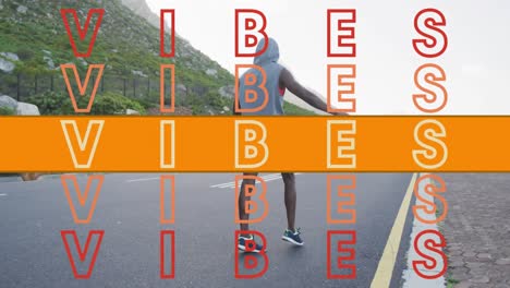 Animation-Des-Wortes-„Vibes“-In-Orange-über-Einem-Mann,-Der-Auf-Einer-Bergstraße-Trainiert