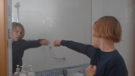 Boxing-Practice-in-Bathroom-Mirror