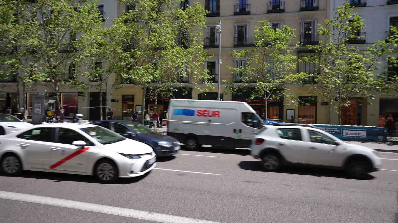 City street scene with traffic and architecture