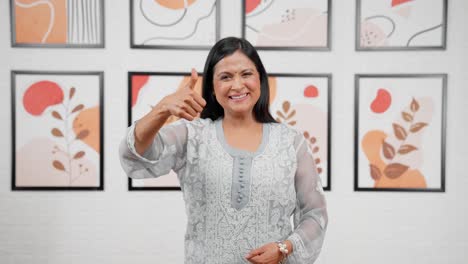 Indian-mother-showing-thumbs-up