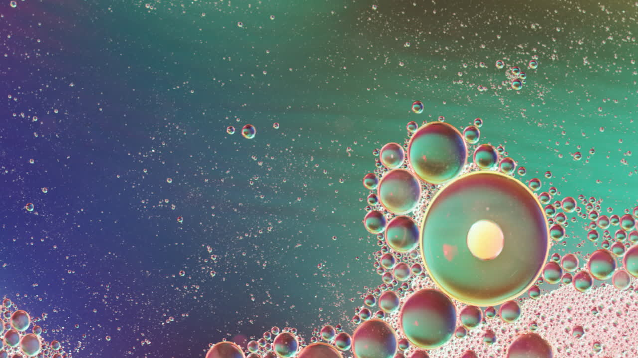 Animation of bubbles moving on blue background with copy space