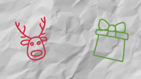 animation of hand drawing christmas decorations on white paper background