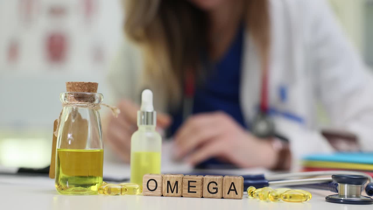 Omega oil and capsules with doctor in the background