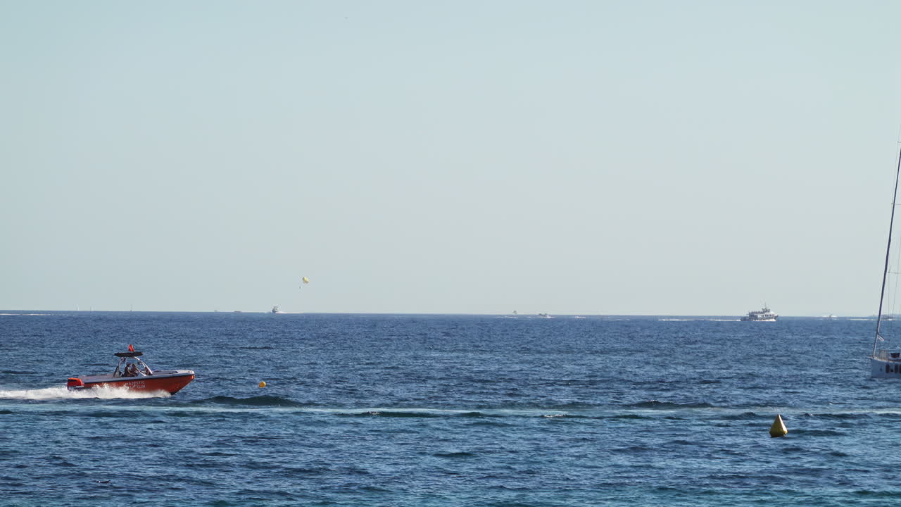 White boats moving on the sea in Cannes, France