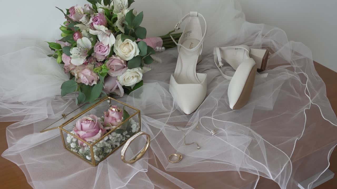 Bridal essentials with bouquet, shoes, and jewelry