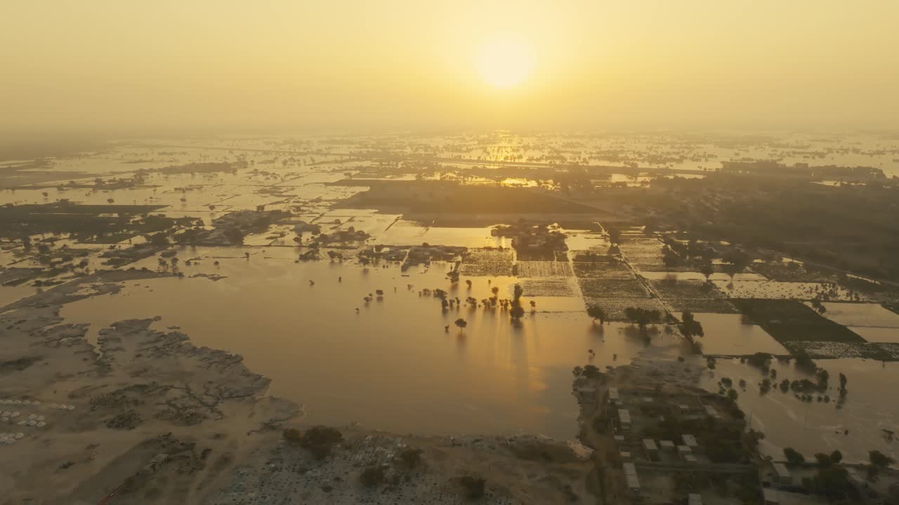 aerial view of flooded Jalalpur Pirwala city at sunset Punjab Pakistan