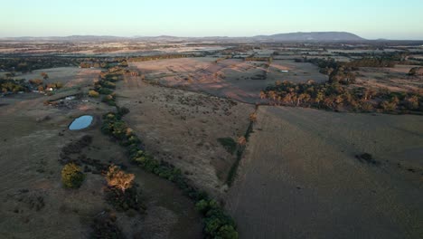 aerial view of landscape near tylden with mount macedon in the distance, victoria, australia. march 2025.