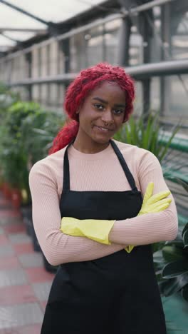 woman gardener in greenhouse