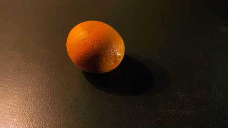 orange spinning until stop on the kitchen counter