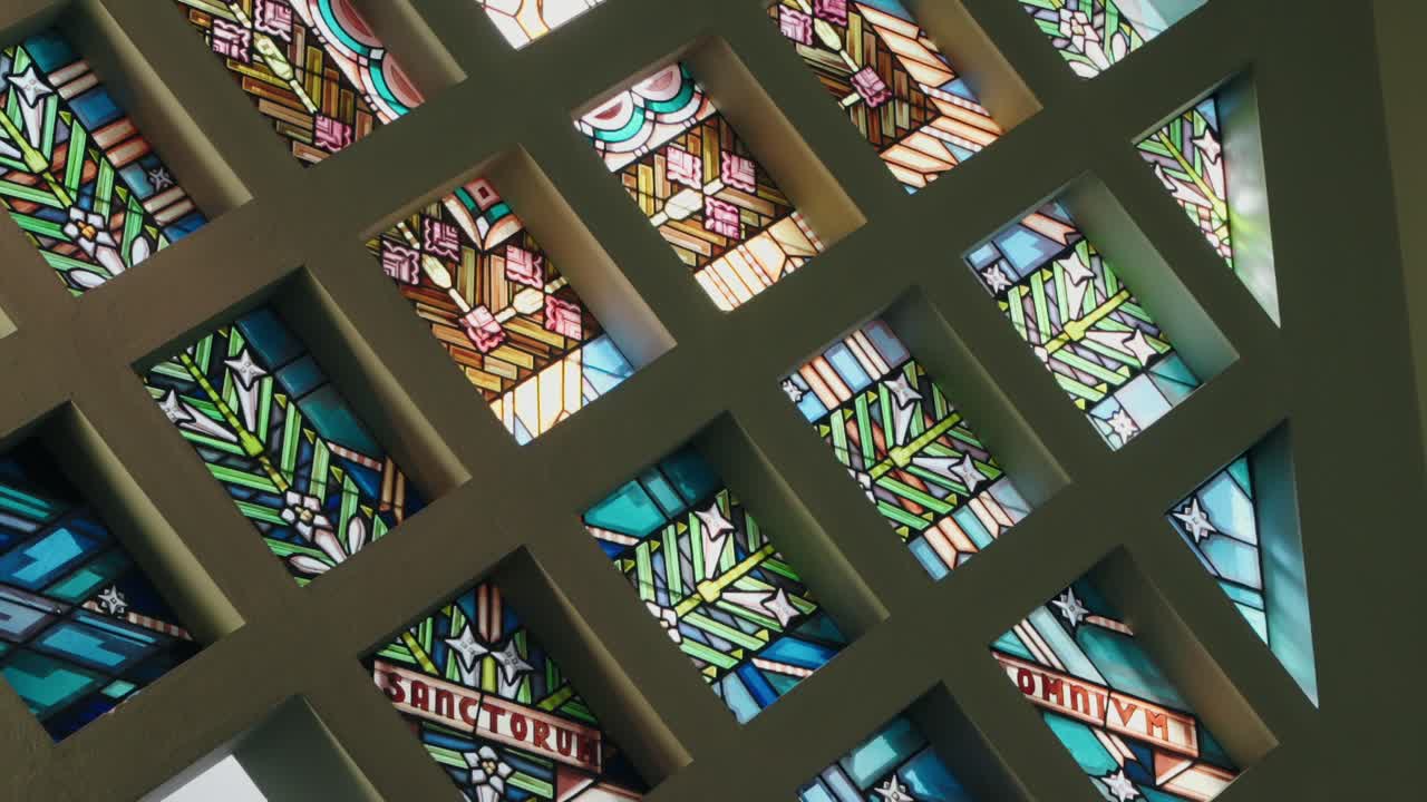 Intricate Stained Glass Window in a Church Sanctuary