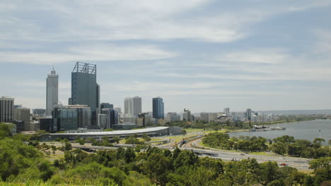 timelapse of the city of perth australia, wide shot of the city on a bright blue sky day