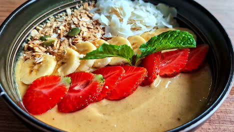 smoothie bowl with fresh fruits, granola, artistic, healthy breakfast