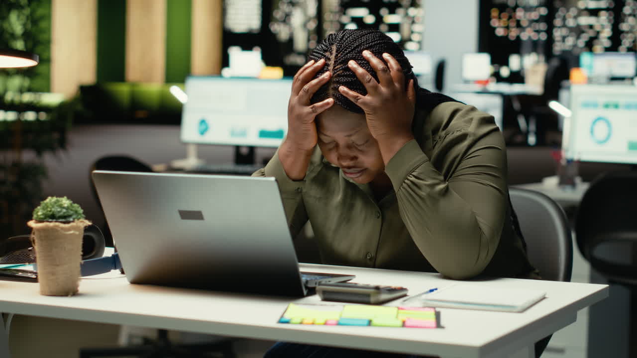 Black restless weary woman experiencing burnout and fatigue late at night