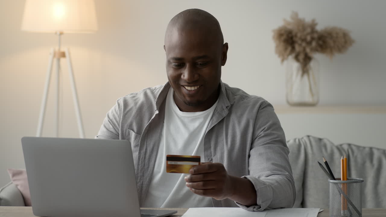 Man using laptop to make an online payment
