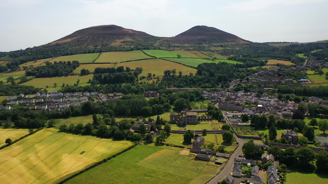 Aerial drone footage of a Scottish rural town – Melrose
