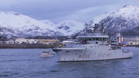 a norwegian navy boat heads out to sea