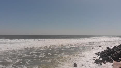 spectators and breaking hurricane waves, editorial
