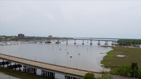aerial drone shot, boats on the water, cloudy day near charleston, sc