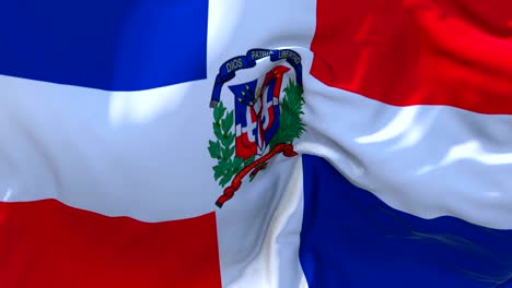 la bandera de la república dominicana ondeando en el viento animación en cámara lenta. 4k textura de tela realista bandera soplando suavemente en un día de viento fondo de bucle continuo sin costuras.