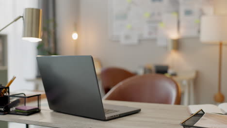 laptop, desk and after hours in an empty office