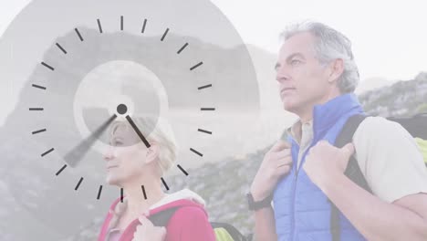 caucasian senior couple hiking in countryside admiring view, over fast moving clock face