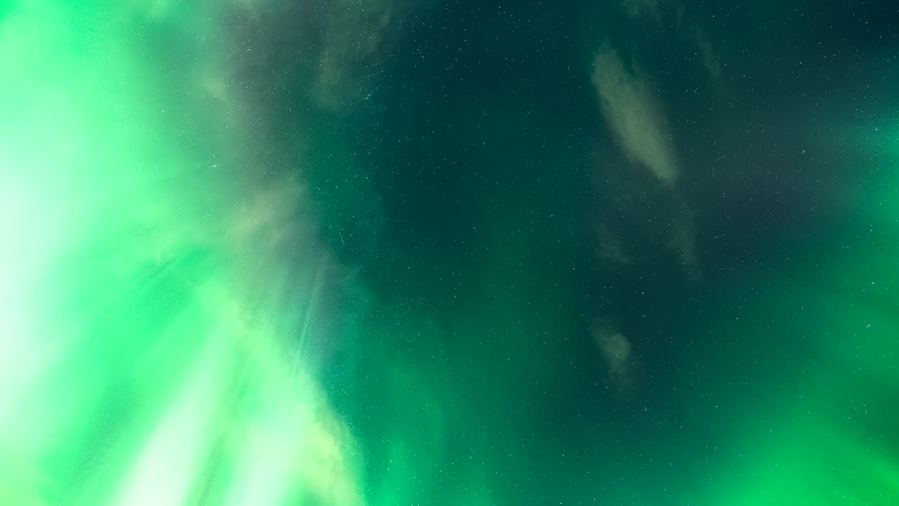 Mystical aurora borealis polar lights in Norway night sky, timelapse upward view