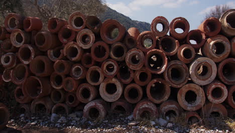 a stack of ancient drainage pipes in ephesus