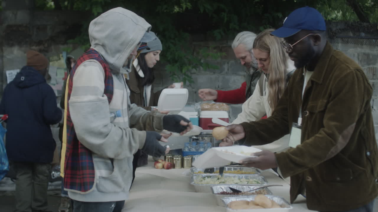 Community Volunteers Distribute Food to People in Need