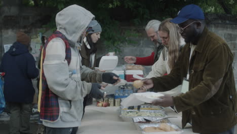 community volunteers distribute food to people in need