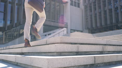 businessman climbing stairs